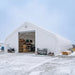 Snow Series 40' x 80' Dual Truss Storage Shelter installed in snowy storage lot.