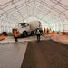 Interior view of Snow Series™ 40' x 60' Dual Truss Storage Shelter with concrete truck