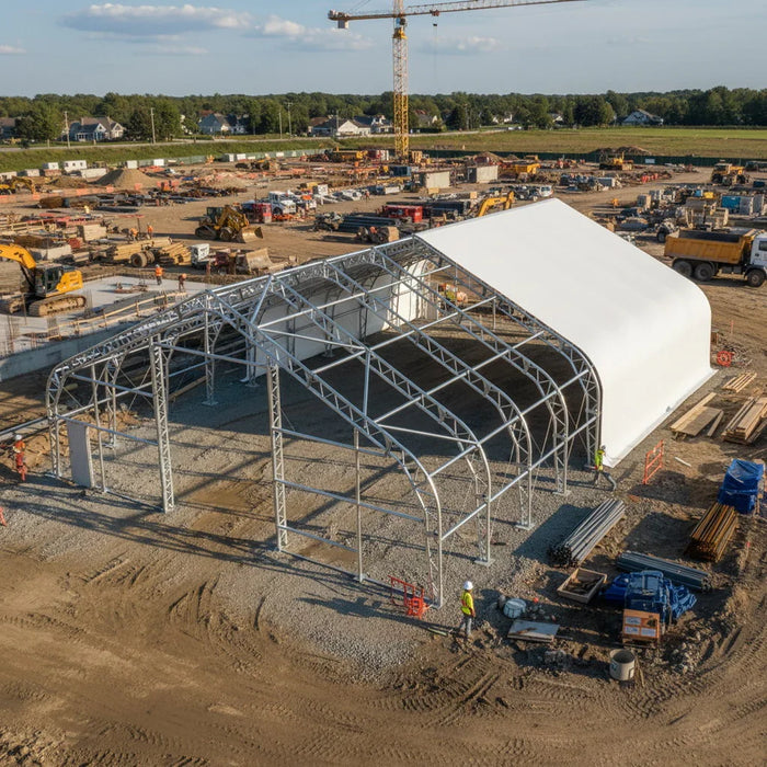 Assembly showing exposed trusses and partial cover, Snow Series™ 40' x 60' Dual Truss Storage Shelter