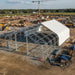 Snow Series 40' x 80' Dual Truss Storage Shelter under assembly at construction site.