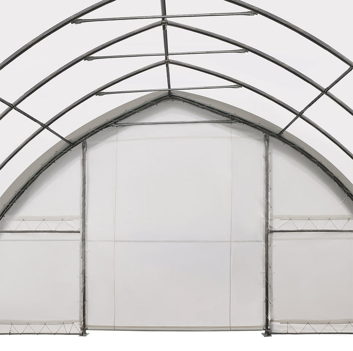 TMG-ST3042V 30' x 40' Peak Ceiling Storage Shelter with heavy-duty 17 oz PVC cover and drive-through roll-up doors
