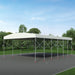 Retractable mobile shelter with white roof on a steel frame with casters and open sides, computer rendering in a park setting