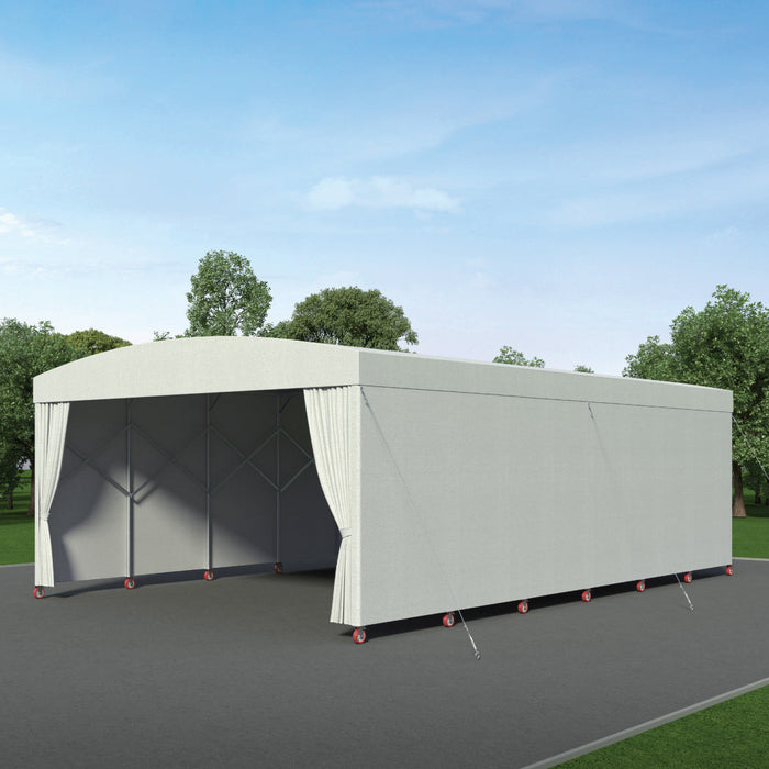 Retractable mobile shelter with white cover and side curtains drawn along one side, rendering on a paved lot