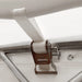Ratchet strap securing cover to steel frame, Snow Series™ 40' x 80' Dual Truss Storage Shelter