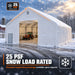 Snow Series 40' x 40' Dual Truss Storage Shelter shown in snowy scene with tractor inside