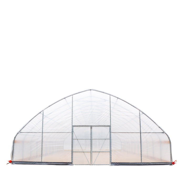 Front elevation of Commercial Tunnel Greenhouse with central double door closed.