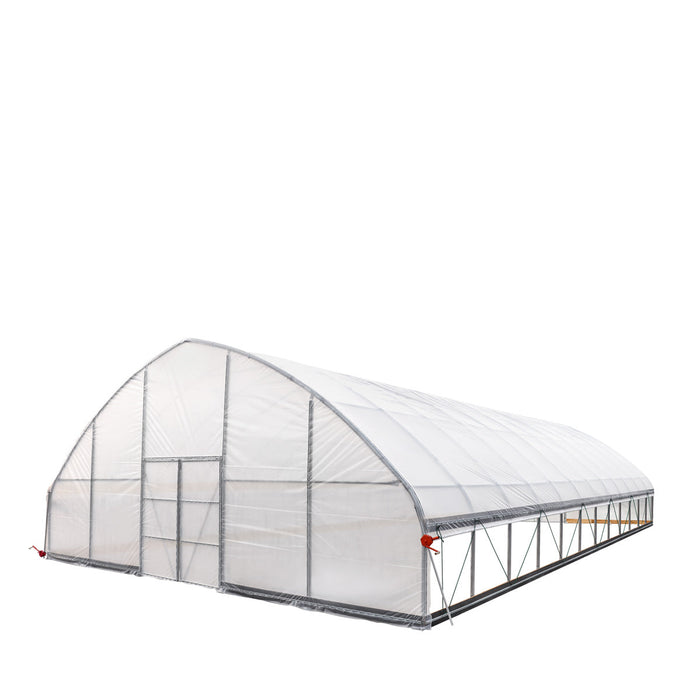 Three-quarter view showing Commercial Tunnel Greenhouse with roll-up sides and cover.