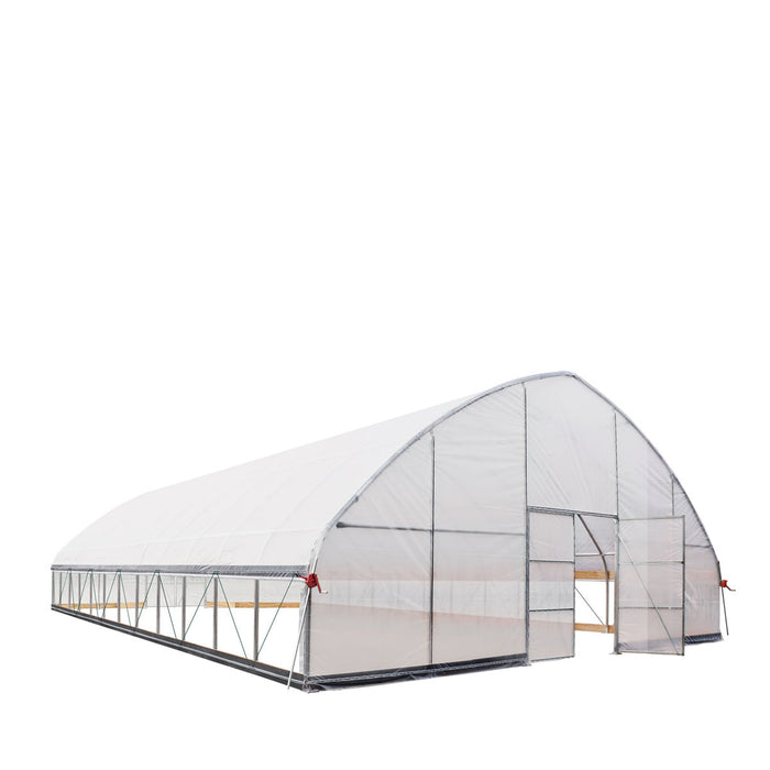 Angled view showing open doorway and side tension straps on Commercial Tunnel Greenhouse.