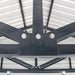 Close-up of bolted truss connection inside metal garage shed roof.
