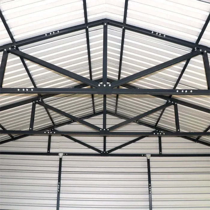 Interior view highlighting black truss system inside metal garage shed.