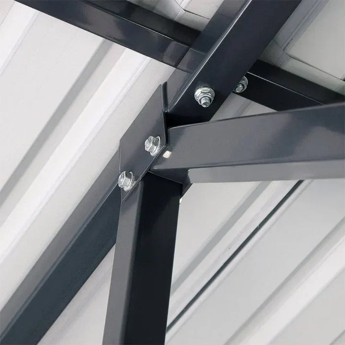 Detailed bolted joint close-up on roof frame of metal garage shed.