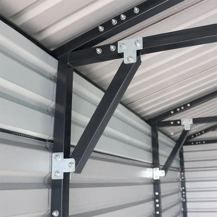Interior sidewall brace and bracket connections inside metal garage shed.