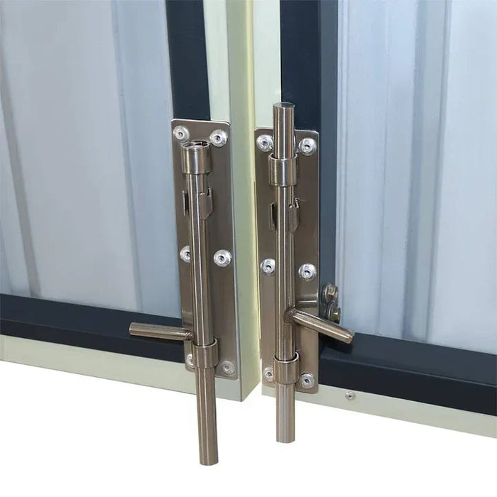 Close-up of vertical door latches mounted on metal garage shed doors.
