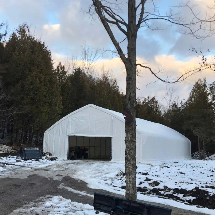 TMG Industrial 30' x 50' Straight Wall Peak Ceiling Storage Shelter with Heavy Duty 17 oz PVC Cover & Drive Through Doors, TMG-ST3050V