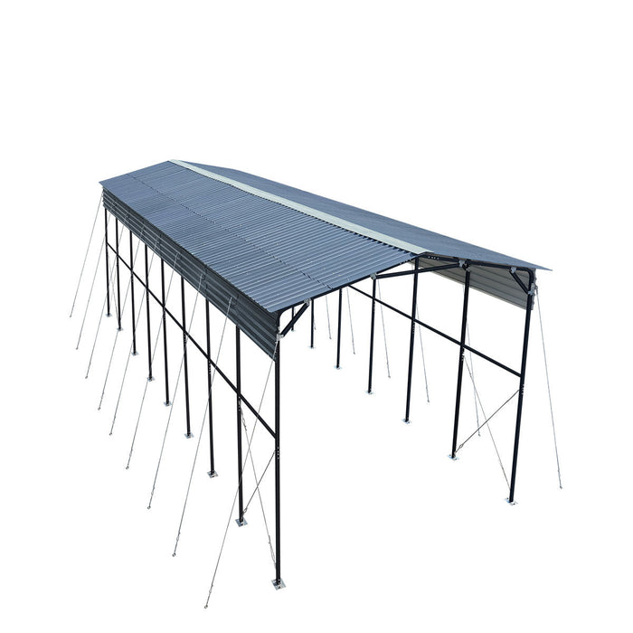 High-angle view displaying full roof ridge and exterior bracing of the metal shed shelter.
