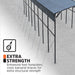 Overhead angle highlighting footplates, cross braces, and guy wires on metal shed shelter.