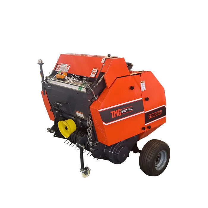 TRB50N round hay baler with orange body, two wheels and yellow PTO shaft connector, on white background