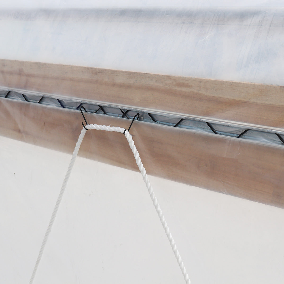 Lock channel and wiggle wire detail securing the TMG-GH2020-V2 greenhouse cover