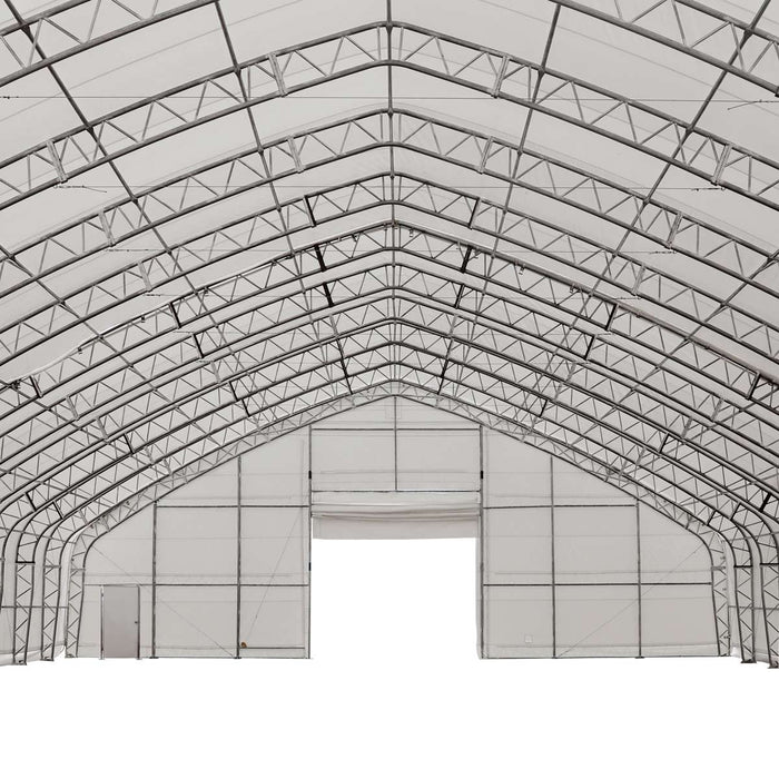 TMG Industrial Pro Series 70' x 120' Dual Truss Storage Shelter with Heavy Duty 32 oz PVC Cover & Drive Through Doors, TMG-DT70120-PRO